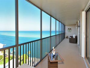 A luxury hotel suite overlooking the ocean.
