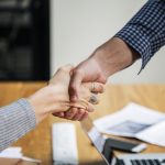 negotiate with moving companies and reach an agreement
