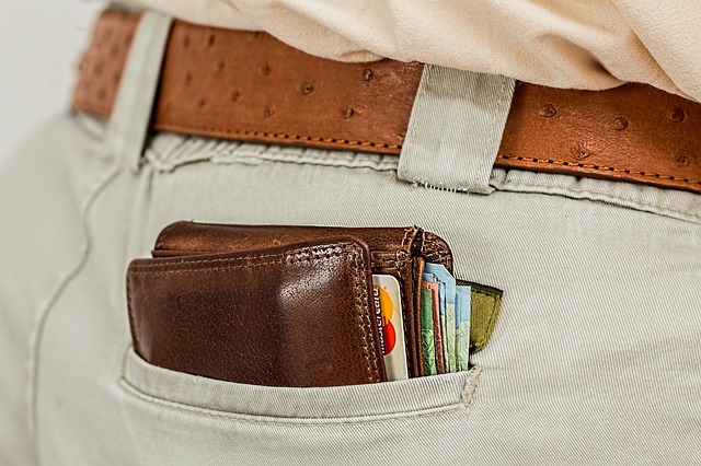 a wallet inside a pocket, representing how to tip your movers